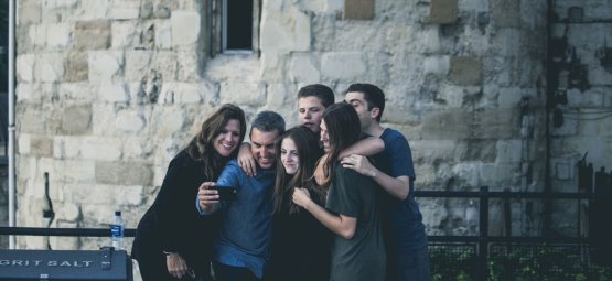 Family of six taking a selfie